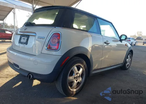 2010 Mini Cooper z USA, uszkodzony, nr VIN WMWMF3C50ATZ66659